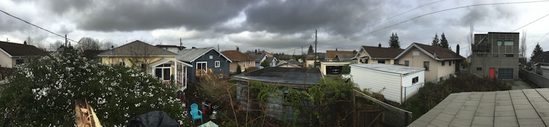 panoramic view of beacon hill, seattle,
                        under low dark clouds