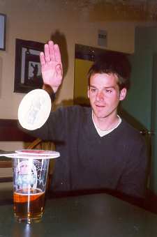 14 beermats
                flipped atop a half-full pint glass!